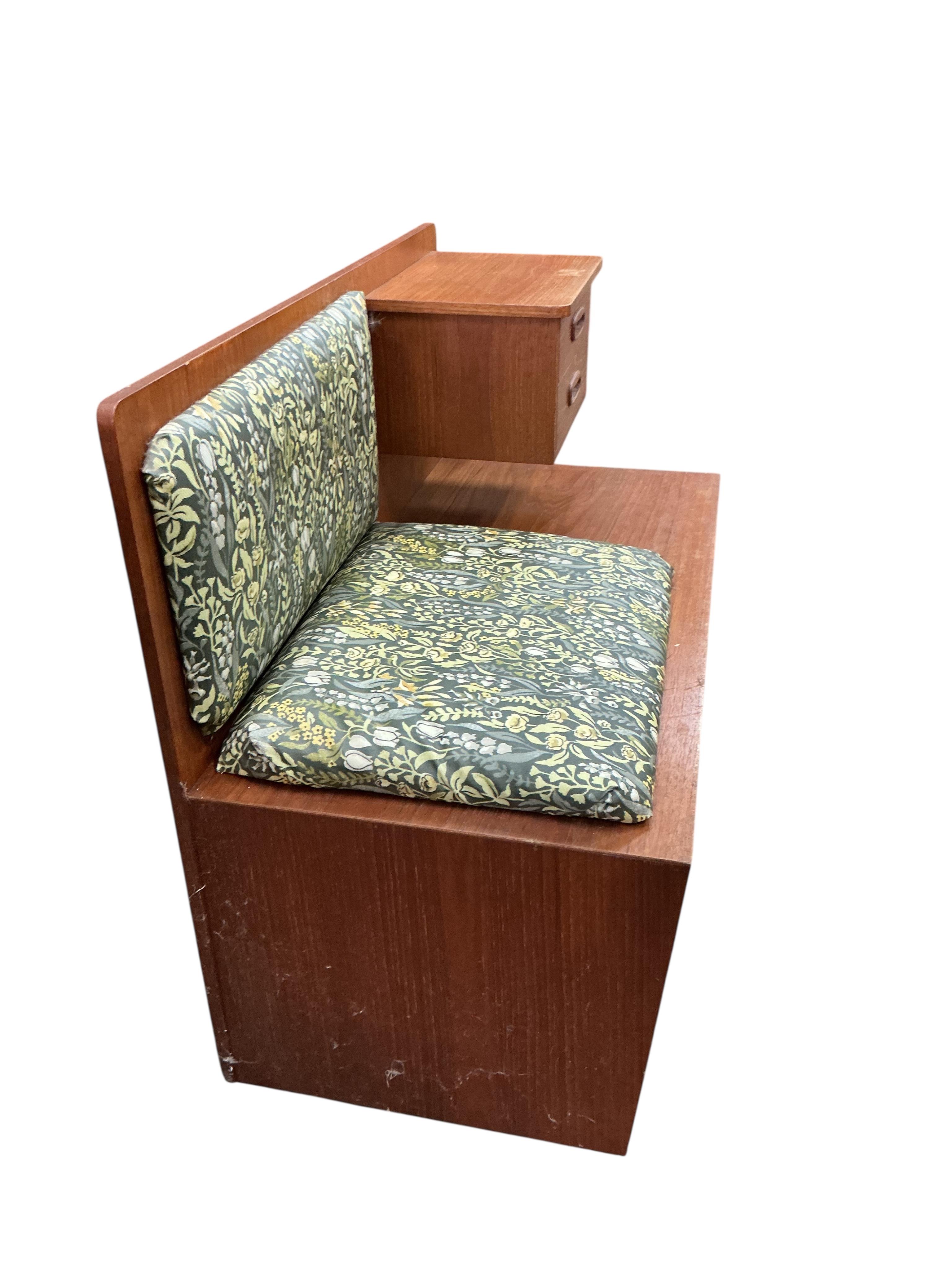 A mid century G Plan teak telephone table, width 84cm, depth 42cm, height 76cm